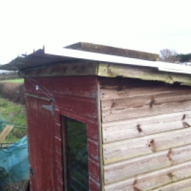 re-roofed, in need of drying and painting